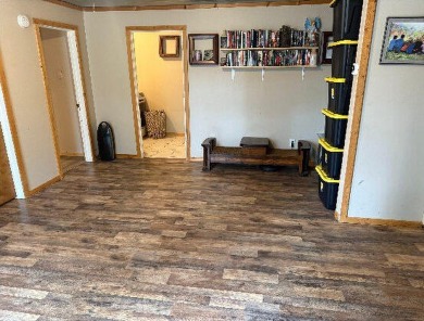 Welcome to this charming 2-bedroom, 1-bath getaway, perfectly on The Loon Golf Resort in Michigan - for sale on GolfHomes.com, golf home, golf lot