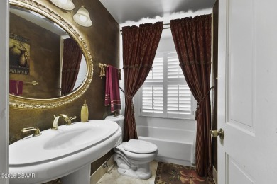 RARE AND DESIRABLE HANGAR HOME OFFERING IN THE EXCLUSIVE SPRUCE on Spruce Creek Golf Club in Florida - for sale on GolfHomes.com, golf home, golf lot