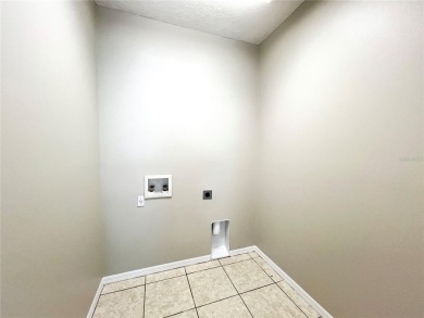Huge Price Improvement! This is the best priced 5 bedroom POOL on Summerfield Crossing Golf Club in Florida - for sale on GolfHomes.com, golf home, golf lot