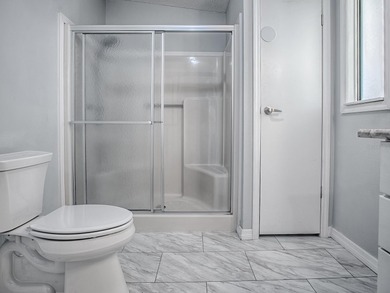 PRICE ADJUSTMENT! Completely remodeled manufactured home located on El Diablo Executive Golf Course in Florida - for sale on GolfHomes.com, golf home, golf lot