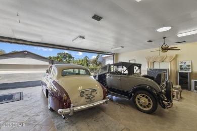 RARE AND DESIRABLE HANGAR HOME OFFERING IN THE EXCLUSIVE SPRUCE on Spruce Creek Golf Club in Florida - for sale on GolfHomes.com, golf home, golf lot