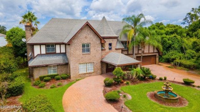 RARE AND DESIRABLE HANGAR HOME OFFERING IN THE EXCLUSIVE SPRUCE on Spruce Creek Golf Club in Florida - for sale on GolfHomes.com, golf home, golf lot