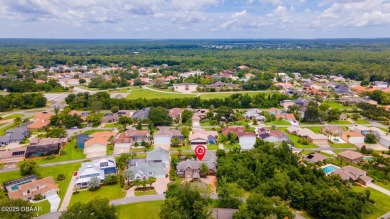 RARE AND DESIRABLE HANGAR HOME OFFERING IN THE EXCLUSIVE SPRUCE on Spruce Creek Golf Club in Florida - for sale on GolfHomes.com, golf home, golf lot