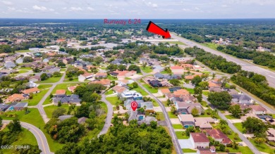 RARE AND DESIRABLE HANGAR HOME OFFERING IN THE EXCLUSIVE SPRUCE on Spruce Creek Golf Club in Florida - for sale on GolfHomes.com, golf home, golf lot