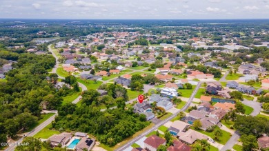 RARE AND DESIRABLE HANGAR HOME OFFERING IN THE EXCLUSIVE SPRUCE on Spruce Creek Golf Club in Florida - for sale on GolfHomes.com, golf home, golf lot