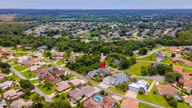 RARE AND DESIRABLE HANGAR HOME OFFERING IN THE EXCLUSIVE SPRUCE on Spruce Creek Golf Club in Florida - for sale on GolfHomes.com, golf home, golf lot