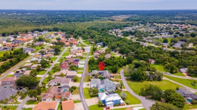 RARE AND DESIRABLE HANGAR HOME OFFERING IN THE EXCLUSIVE SPRUCE on Spruce Creek Golf Club in Florida - for sale on GolfHomes.com, golf home, golf lot