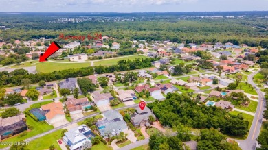 RARE AND DESIRABLE HANGAR HOME OFFERING IN THE EXCLUSIVE SPRUCE on Spruce Creek Golf Club in Florida - for sale on GolfHomes.com, golf home, golf lot
