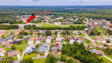 RARE AND DESIRABLE HANGAR HOME OFFERING IN THE EXCLUSIVE SPRUCE on Spruce Creek Golf Club in Florida - for sale on GolfHomes.com, golf home, golf lot