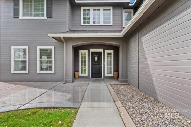 A covered entrance and dramatic vaulted foyer with natural light on Boise Ranch Golf Course, Inc. in Idaho - for sale on GolfHomes.com, golf home, golf lot
