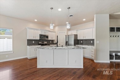 A covered entrance and dramatic vaulted foyer with natural light on Boise Ranch Golf Course, Inc. in Idaho - for sale on GolfHomes.com, golf home, golf lot