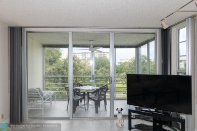 PRICE REDUCED. All the details that make a house a home with a on Palm-Aire Country Club and Resort - Palms in Florida - for sale on GolfHomes.com, golf home, golf lot