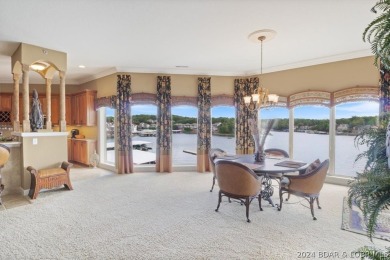 If you are looking for an awesome view of the lake, then this on Seasons Ridge At Four Seasons in Missouri - for sale on GolfHomes.com, golf home, golf lot
