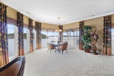 If you are looking for an awesome view of the lake, then this on Seasons Ridge At Four Seasons in Missouri - for sale on GolfHomes.com, golf home, golf lot
