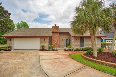 Tucked away in one of Gulf Breeze's most desirable waterfront on Tiger Point Golf and Country Club in Florida - for sale on GolfHomes.com, golf home, golf lot