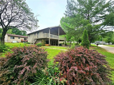 This home features 3 bedroom 2 bathroom, a huge deck that offers on Lake Valley Country Club in Missouri - for sale on GolfHomes.com, golf home, golf lot