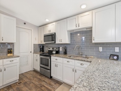 Meticulously maintained, move-in ready home with all the on Barefoot Bay Golf Course in Florida - for sale on GolfHomes.com, golf home, golf lot