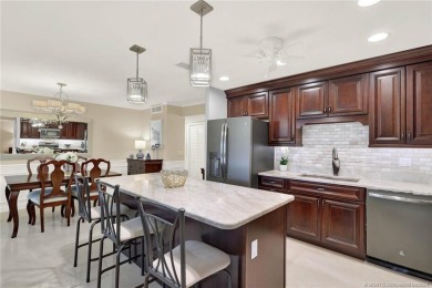 Impeccable *completely remodeled* corner unit offers all the on Martin County Golf Course in Florida - for sale on GolfHomes.com, golf home, golf lot