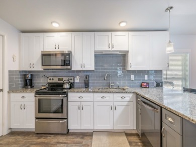 Meticulously maintained, move-in ready home with all the on Barefoot Bay Golf Course in Florida - for sale on GolfHomes.com, golf home, golf lot