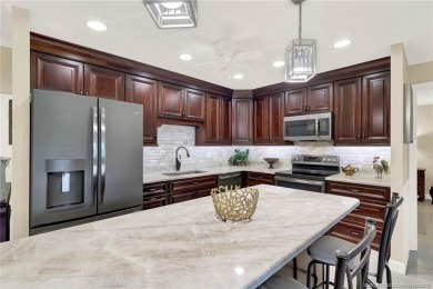 Impeccable *completely remodeled* corner unit offers all the on Martin County Golf Course in Florida - for sale on GolfHomes.com, golf home, golf lot