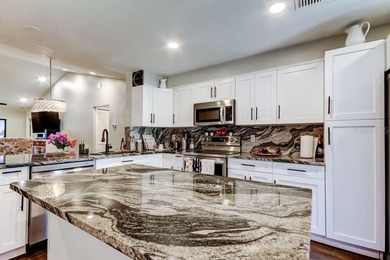 Welcome to the peaceful condo community of Eagles Glen. This on Countryside Country Club in Florida - for sale on GolfHomes.com, golf home, golf lot