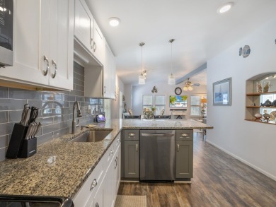 Meticulously maintained, move-in ready home with all the on Barefoot Bay Golf Course in Florida - for sale on GolfHomes.com, golf home, golf lot