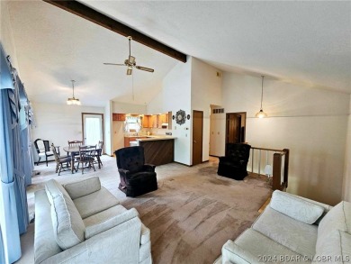 This home features 3 bedroom 2 bathroom, a huge deck that offers on Lake Valley Country Club in Missouri - for sale on GolfHomes.com, golf home, golf lot