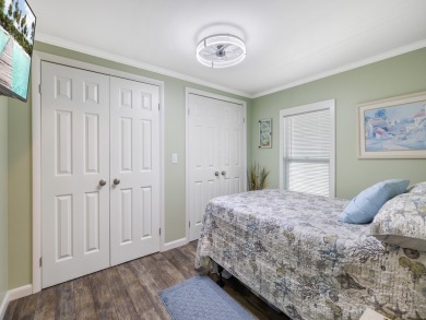 Meticulously maintained, move-in ready home with all the on Barefoot Bay Golf Course in Florida - for sale on GolfHomes.com, golf home, golf lot
