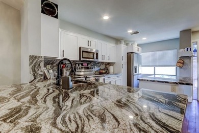 Welcome to the peaceful condo community of Eagles Glen. This on Countryside Country Club in Florida - for sale on GolfHomes.com, golf home, golf lot