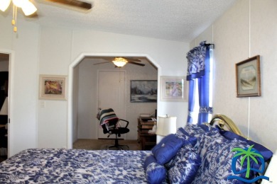 **Charming Waterfront Retreat in Florida!** NEW ROOF 2025! on Cypresswood Golf and Country Club in Florida - for sale on GolfHomes.com, golf home, golf lot