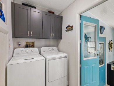 Meticulously maintained, move-in ready home with all the on Barefoot Bay Golf Course in Florida - for sale on GolfHomes.com, golf home, golf lot