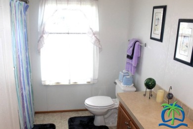 **Charming Waterfront Retreat in Florida!** NEW ROOF 2025! on Cypresswood Golf and Country Club in Florida - for sale on GolfHomes.com, golf home, golf lot
