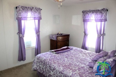 **Charming Waterfront Retreat in Florida!** NEW ROOF 2025! on Cypresswood Golf and Country Club in Florida - for sale on GolfHomes.com, golf home, golf lot