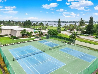 Impeccable *completely remodeled* corner unit offers all the on Martin County Golf Course in Florida - for sale on GolfHomes.com, golf home, golf lot