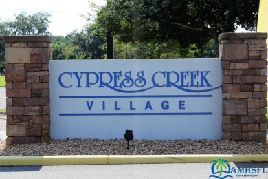 **Charming Waterfront Retreat in Florida!** NEW ROOF 2025! on Cypresswood Golf and Country Club in Florida - for sale on GolfHomes.com, golf home, golf lot