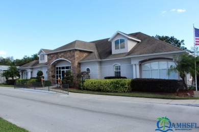 **Charming Waterfront Retreat in Florida!** NEW ROOF 2025! on Cypresswood Golf and Country Club in Florida - for sale on GolfHomes.com, golf home, golf lot