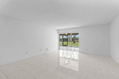 GORGEOUS FULLY 1ST FLOOR CONDO | PRESTIGIOUS 55+ COMMUNITY OF on  in Florida - for sale on GolfHomes.com, golf home, golf lot