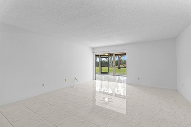 GORGEOUS FULLY 1ST FLOOR CONDO | PRESTIGIOUS 55+ COMMUNITY OF on Boca Dunes Golf and Country Club in Florida - for sale on GolfHomes.com, golf home, golf lot