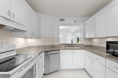 GORGEOUS FULLY 1ST FLOOR CONDO | PRESTIGIOUS 55+ COMMUNITY OF on Boca Dunes Golf and Country Club in Florida - for sale on GolfHomes.com, golf home, golf lot