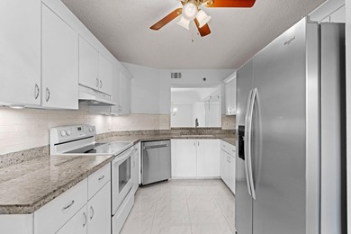 GORGEOUS FULLY 1ST FLOOR CONDO | PRESTIGIOUS 55+ COMMUNITY OF on  in Florida - for sale on GolfHomes.com, golf home, golf lot