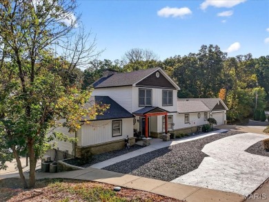 Beautiful 1.5-story waterfront home in the gated lake & golf on Raintree Country Club in Missouri - for sale on GolfHomes.com, golf home, golf lot