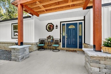 Beautiful 1.5-story waterfront home in the gated lake & golf on Raintree Country Club in Missouri - for sale on GolfHomes.com, golf home, golf lot