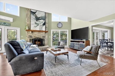 Beautiful 1.5-story waterfront home in the gated lake & golf on Raintree Country Club in Missouri - for sale on GolfHomes.com, golf home, golf lot