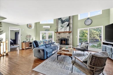 Beautiful 1.5-story waterfront home in the gated lake & golf on Raintree Country Club in Missouri - for sale on GolfHomes.com, golf home, golf lot