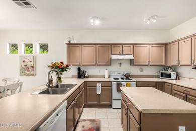 The spacious, open-concept layout seamlessly integrates the on Springfield Golf Resort in Arizona - for sale on GolfHomes.com, golf home, golf lot