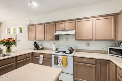 The spacious, open-concept layout seamlessly integrates the on Springfield Golf Resort in Arizona - for sale on GolfHomes.com, golf home, golf lot