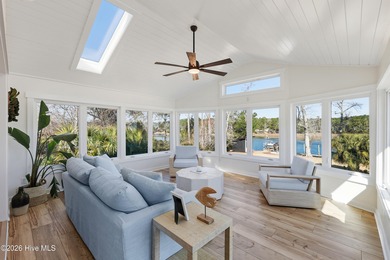 Tucked along a peaceful deep-water canal in the sought-after on Olde Point Golf and Country Club in North Carolina - for sale on GolfHomes.com, golf home, golf lot