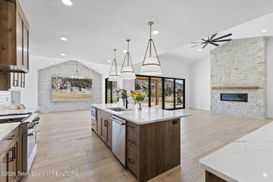 Immerse yourself in the best of Teton Valley living with this on Teton Reserve in Idaho - for sale on GolfHomes.com, golf home, golf lot