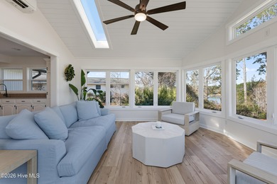 Tucked along a peaceful deep-water canal in the sought-after on Olde Point Golf and Country Club in North Carolina - for sale on GolfHomes.com, golf home, golf lot