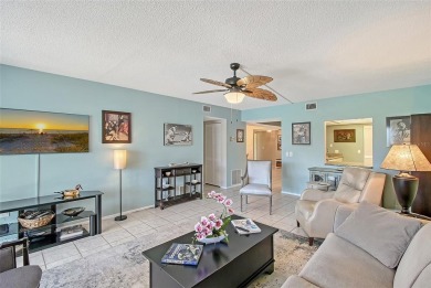 Welcome to Your Lakeside Paradise at 6472 Seagull Terrace #301 on IMG Academies Golf and Country Club in Florida - for sale on GolfHomes.com, golf home, golf lot